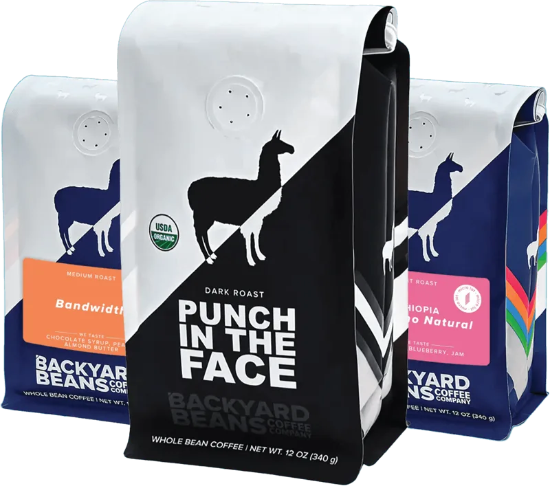 Three bags of Backyard Beans coffee